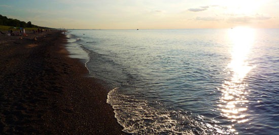 Heavy rain and sewer overflows worsen Great Lakes beach pollution