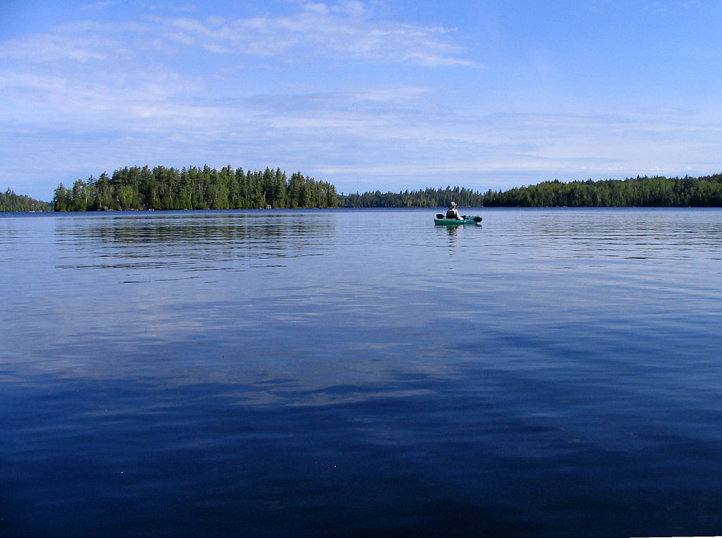 lakes of the adirondacks / Upper Saranac Lake kayaker