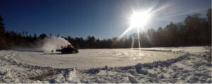 The bog being actively plowed in 2021 so that the team can assess plankton communities below the ice. 