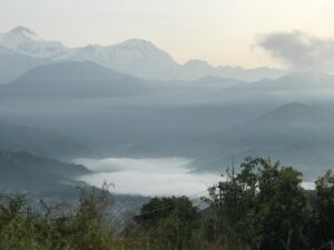 Mist over the Himalayas- and Pokhara lake. 