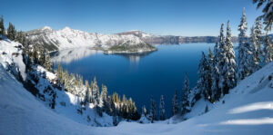 Panoramic winter view of Crater Lake in Crater Lake National Park, Oregon, from Rim Village