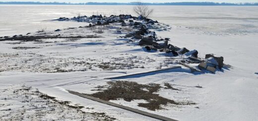 Grand Lake St. Mary's covered in ice and snow