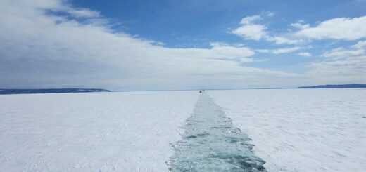 USCG Mackinaw in Lake Superior breaks a path in the ice for freighters travelling from Soo Locks. March 21, 2014. Understanding of Ice cover dynamics in lakes like this are an essential part of winter transport.